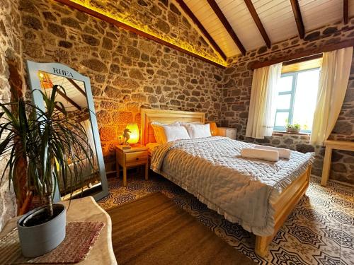 Postel nebo postele na pokoji v ubytování Rhea Guesthouse - Pergamon