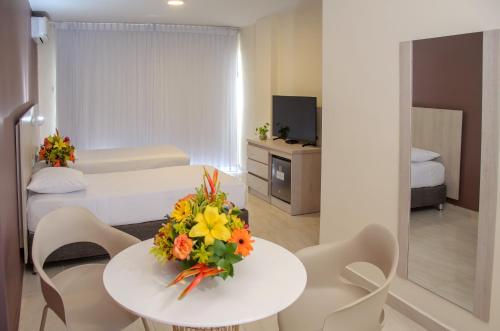 Hotel Be La Sierraにあるテレビまたはエンターテインメントセンター