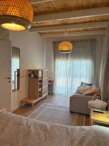 Ένα ή περισσότερα κρεβάτια σε δωμάτιο στο Aviner Guest house 80m- Without garden