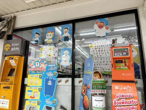 a store window with snowboards on display at Apamet Hotel Sukhumvit 55 in Khlong Toei