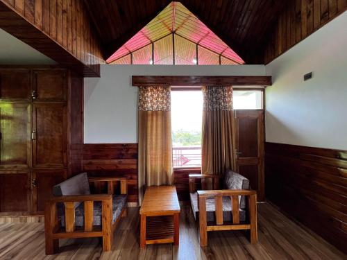 Χώρος καθιστικού στο Aangan Homes - Dobhi, Manali