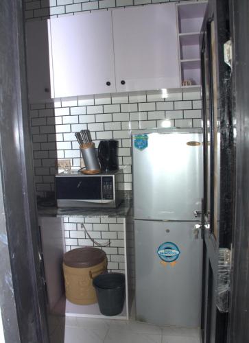 Bilik mandi di Luxury Egbeda Apartments
