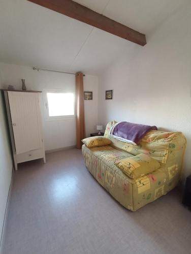 Un ou plusieurs lits dans un hébergement de l'établissement Villa 3 chambres vue mer Valcros