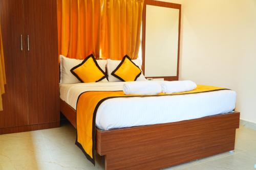 Postel nebo postele na pokoji v ubytování UJ Pallazzio - Business Class Luxury Hotel