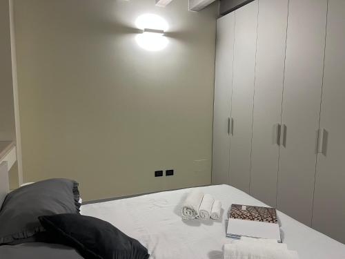 Postel nebo postele na pokoji v ubytování Stelle di Verona - Cordelia