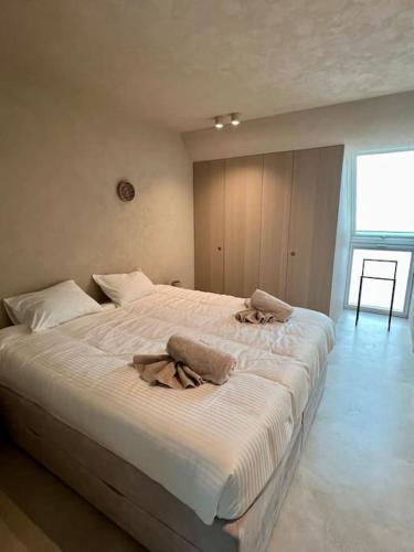 Postel nebo postele na pokoji v ubytování Beach House Stellar