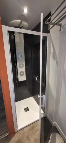a small bathroom with a toilet in a room at le palierou in Paulhe