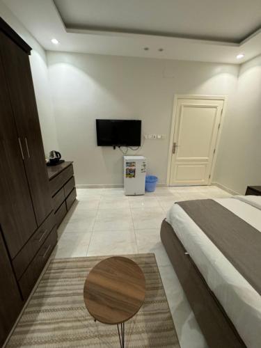 TV a/nebo společenská místnost v ubytování New Time Apartments