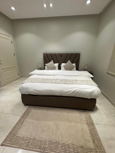 Postel nebo postele na pokoji v ubytování New Time Apartments