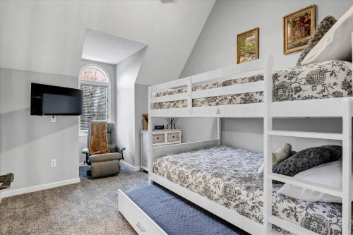 Postel nebo postele na pokoji v ubytování Bluebird Cottage