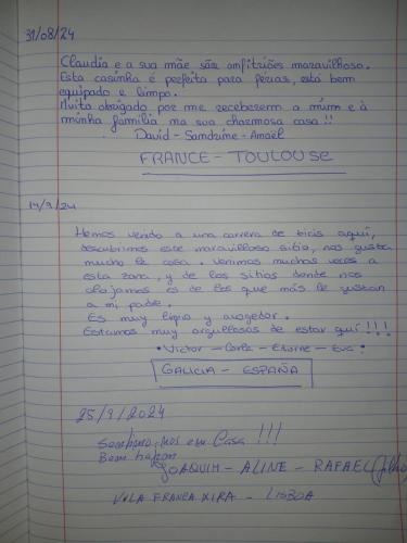 a sheet of paper with handwriting on it at Casinha Ponte Nova in Monção