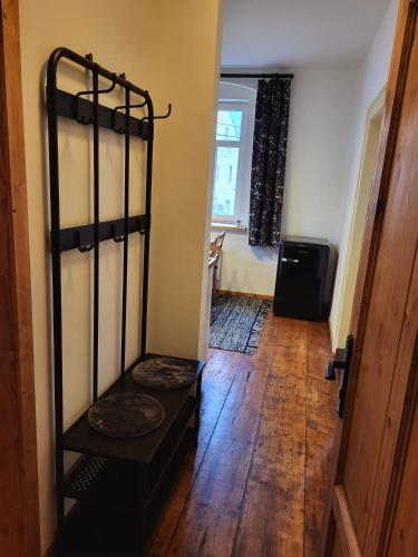 a room with a black metal bunk bed in a room at Velflík - ubytování v srdci Krušných hor in Abertamy