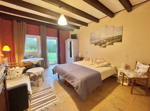 Postel nebo postele na pokoji v ubytování Gîte des Fours