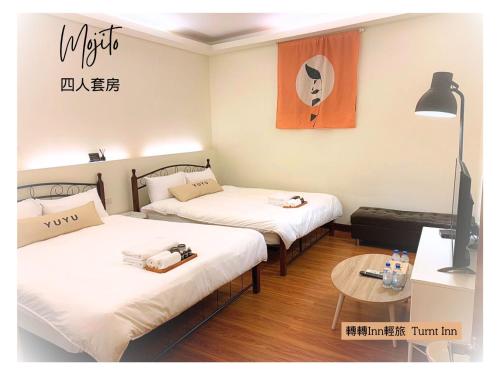Postel nebo postele na pokoji v ubytování 轉轉lnn輕旅 Turnt Inn
