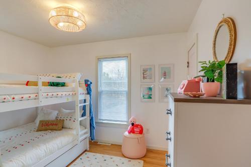 a bedroom with two bunk beds and a window at Walk to Beach Home with Pool in Vermilion in Vermilion