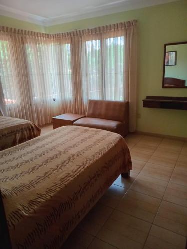 Postel nebo postele na pokoji v ubytování Departamento amoblado en segundo piso