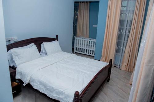 Ένα ή περισσότερα κρεβάτια σε δωμάτιο στο The elfa home - family recede