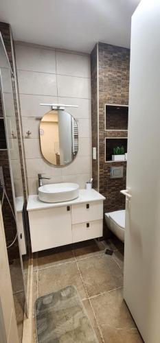 Ένα μπάνιο στο Aura Vake, Luxury Apartment