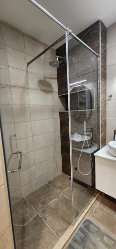 Ένα μπάνιο στο Aura Vake, Luxury Apartment