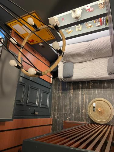 a room with two bunk beds and a table at Smart Home in Thessaloniki