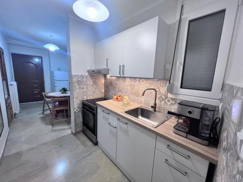 Η κουζίνα ή μικρή κουζίνα στο Victorias house