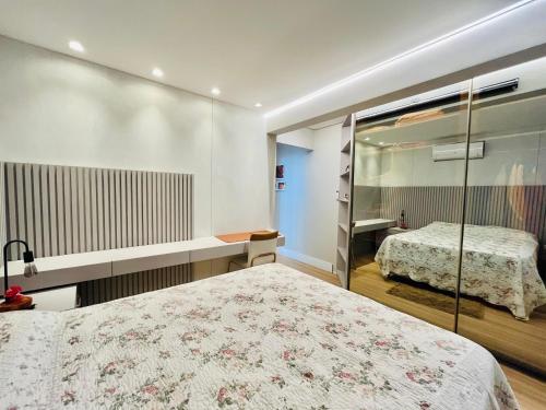 Postel nebo postele na pokoji v ubytování Residencial Turin - Cobertura para 8 pessoas na Praia de Palmas a 350m do mar