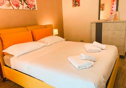 Postel nebo postele na pokoji v ubytování Divino Amore house of relax