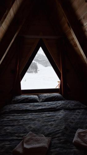 a view of a bed in a tent at The View Smrcevo Brdo in Žabljak