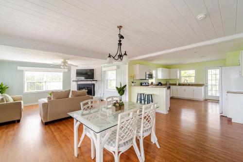 a kitchen and living room with a table and chairs at Private Rooms In Bradenton - Close to Sarasota in Bradenton