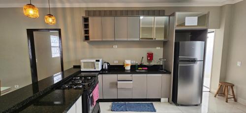 Dapur atau dapur kecil di Casa espaçosa, mesa de sinuca e piscina aquecida!