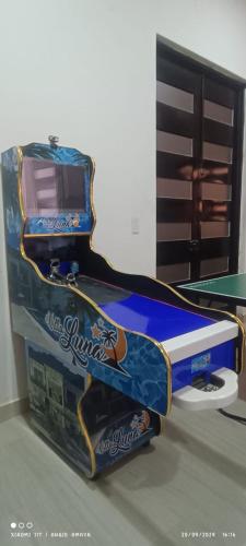 a box with a video game on top of it at Villa luna in Carmen de Apicalá