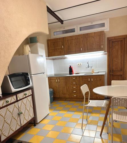 Η κουζίνα ή μικρή κουζίνα στο Tarraco Cathedral Cottage