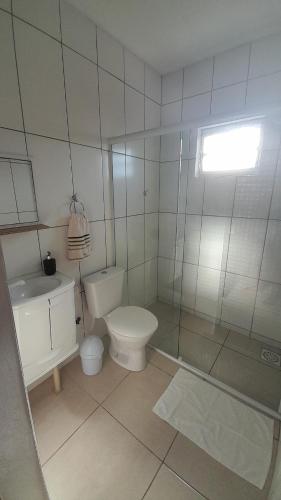 Koupelna v ubytování Itapiruba 250 m da Praia - Casa Secundária - Fundos