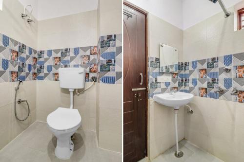 a bathroom with a toilet and a sink at Super Collection O The Kailash Hotel in Dehradun