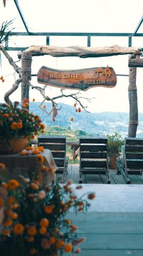 a table with a sign that reads lunch office and hospitality at Nhiên Farm Homestay in Xuân Trường
