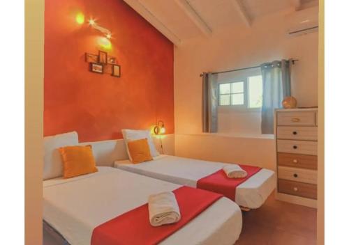 Postel nebo postele na pokoji v ubytování Kajoane's villa