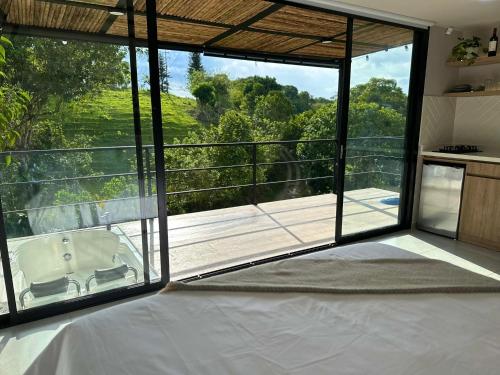 Postel nebo postele na pokoji v ubytování Cielo Abierto Cabaña Glamping
