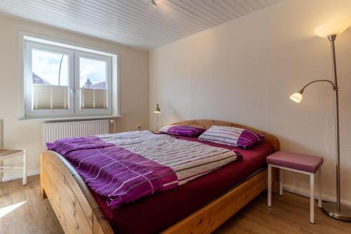 Postel nebo postele na pokoji v ubytování Ferienhaus in Tönning