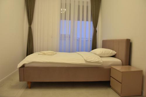 Cama o camas de una habitación en Luxory Apartaments