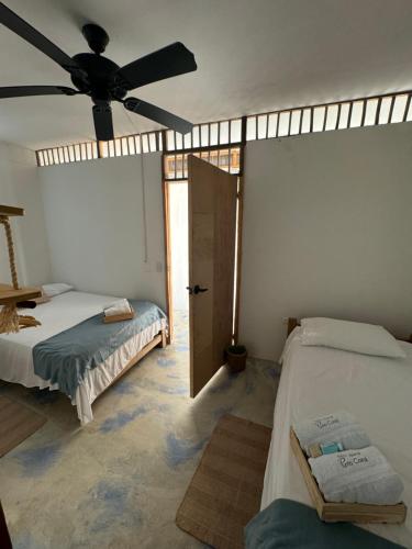 Voodi või voodid majutusasutuse Cabaña Punta Coral toas