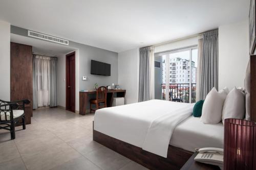 Postel nebo postele na pokoji v ubytování Vrest Hotel