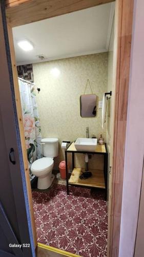 Bilik mandi di Cabaña en ambiente familiar