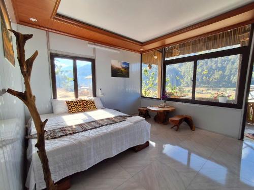 Postel nebo postele na pokoji v ubytování Mu Cang Homestay