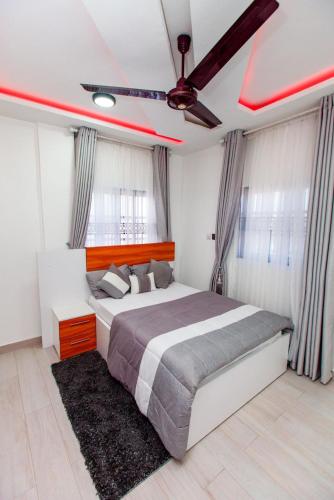 Katil atau katil-katil dalam bilik di Plum Royal Estates - Suite 1