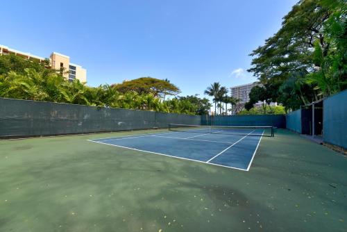 a tennis court with a net on it at Mahana 602 · MA 602 Kaanapali OceanFront Studio Ocean View Pool in Kahana
