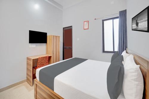 Televisyen dan/atau pusat hiburan di HOTEL O ROYAL GUEST HOUSE
