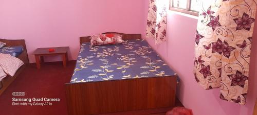 Postel nebo postele na pokoji v ubytování Saura Point Home Stay