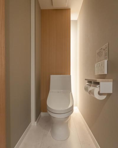 a bathroom with a white toilet in a room at Tokyo Modern Stay Shinjuku in Tokyo