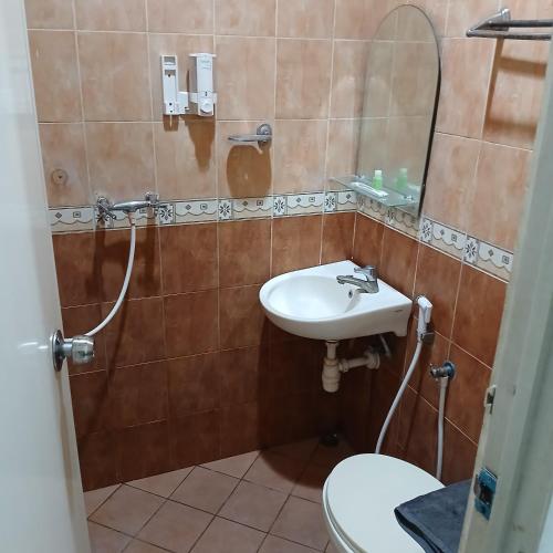 Koupelna v ubytování Ketapang Residence Hotel