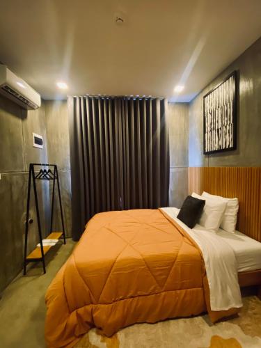 Ένα ή περισσότερα κρεβάτια σε δωμάτιο στο 518Hotel